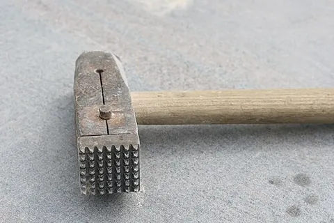 bush hammer: a square-headed hammer with spikes used in stoneworking to either even the surface before...