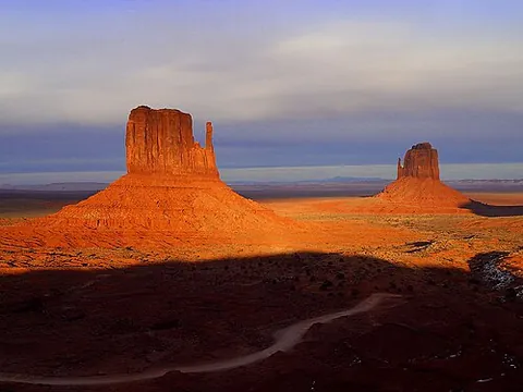 butte: an isolated hill with steep sides and a flat top