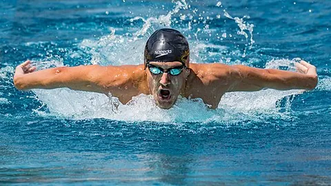 butterfly stroke: a swimming stroke in which the body is prone, the arms are moved in simultaneous circles, and the...