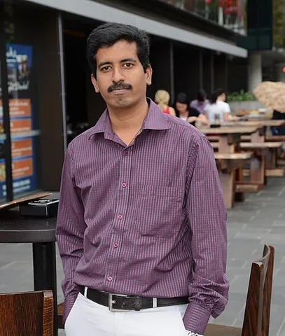 button-up: a shirt fastened by a vertical column of buttons at the front