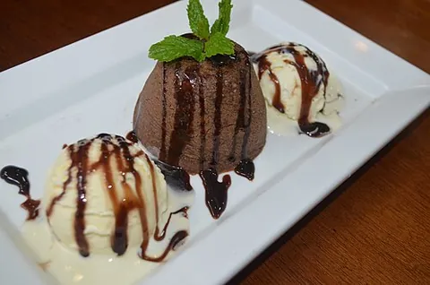 petit gâteau: a French chocolate dessert, consisting of a small cake with a crunchy shell and a creamy filling