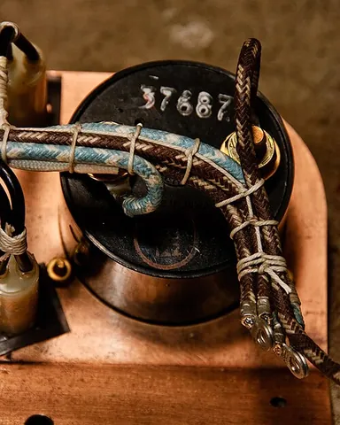 cable-lacing: a technique for bundling and securing wire harnesses using waxed cord or flat tape, creating neat,...