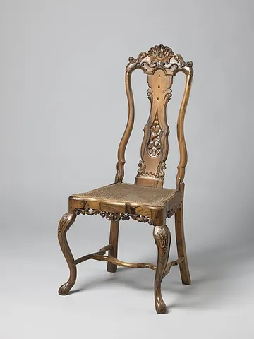 cabriole: a type of furniture leg used in certain ornate styles of furniture such as Queen Anne, having a...