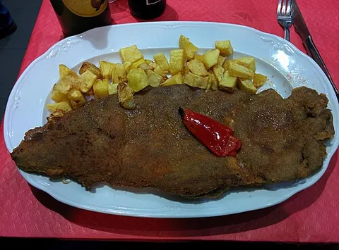 cachopo: an Asturian dish consisting of two deep-fried breaded cutlets of meat (normally veal or beef but...