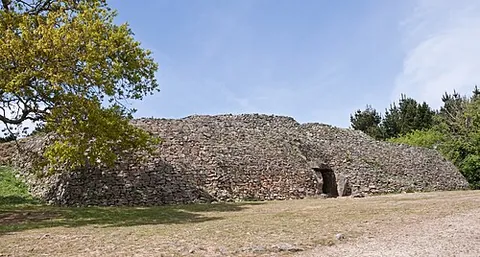 cairn: a rounded or conical heap of stones erected by early inhabitants of the British Isles, apparently...