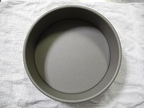 cake tin: the tin in which a cake is baked
