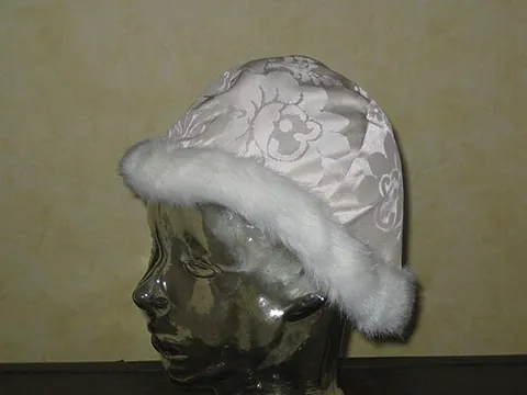 camauro: a cap, of crimson velvet, trimmed with ermine, worn by the pope
