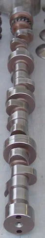 camshaft: a shaft fitted with cams; especially one in a piston engine that activates the valves