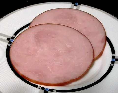 canadian bacon: cured pork made only from the loin, with no belly meat, and sold in lean medallions