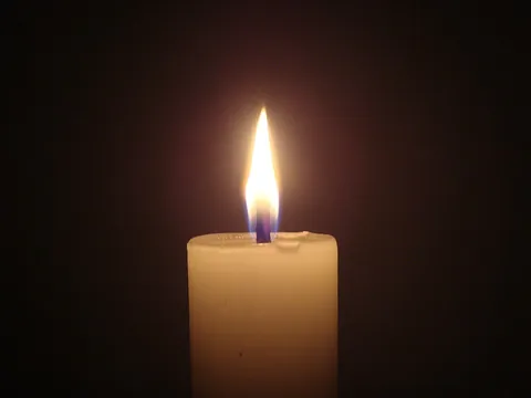 candle: a light source consisting of a wick embedded in a solid, flammable substance such as wax, tallow,...