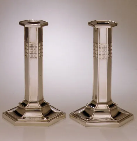 candlestick: a holder with a socket or spike for a candle