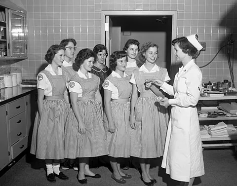 candy striper: a volunteer worker in a hospital or hospice