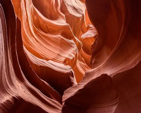 canyon: a valley, especially a long, narrow, steep valley, cut in rock by a river