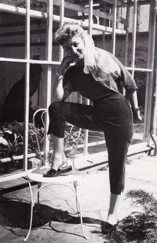 capri pants: casual pants or trousers, usually for women, with the bottom hem reaching to below the knee but...