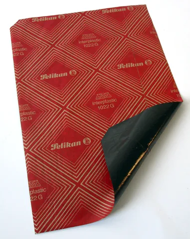 carbon paper: paper with one of the faces impregnated with carbon, used to make carbon copies