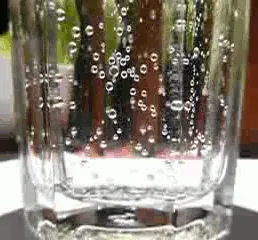 carbonated water: water that contains carbon dioxide dissolved in it under pressure and is intended for drinking