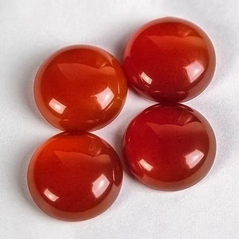 carnelian: a hard, reddish brown chalcedony used in jewelry