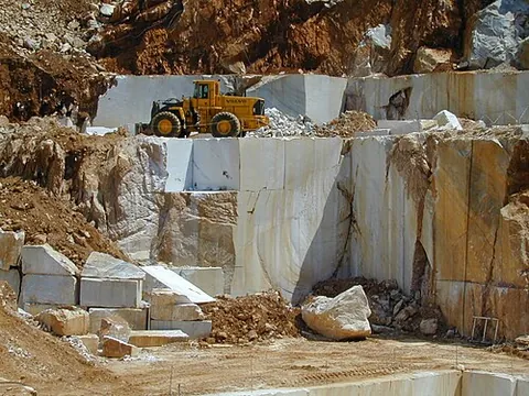 carrara marble: a kind of white or blue-grey marble popular for use in sculpture and building decor, quarried since...