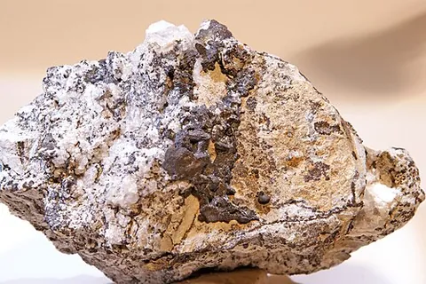 carrollite: an isometric-hexoctahedral mineral containing cobalt, copper, nickel, and sulfur
