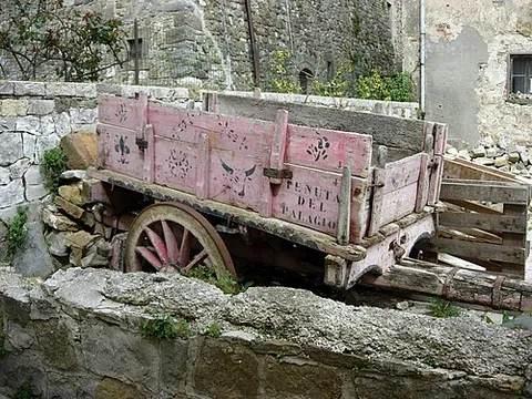 cart: a small, open, wheeled vehicle, drawn or pushed by a person or animal, often with two wheels on one...