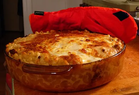 casserole: a dish of glass or earthenware, with a lid, in which food is baked and sometimes served