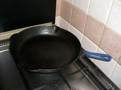 cast iron: a hard and brittle, but strong, alloy of iron, carbon, and silicon, formed by casting in a mould