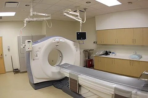 cat scanner: a scanner used in a CAT scan