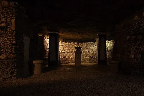 catacomb: an underground system of tunnels and chambers with recesses for graves, used (in former times) as a...