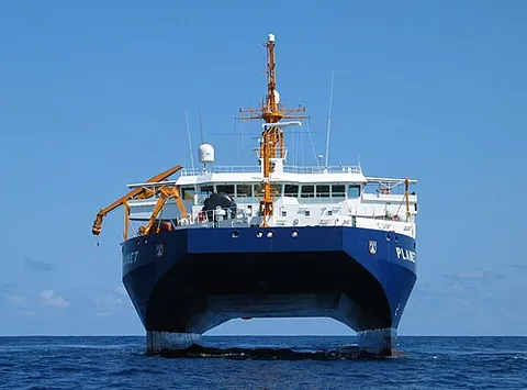 catamaran: a twin-hulled ship or boat
