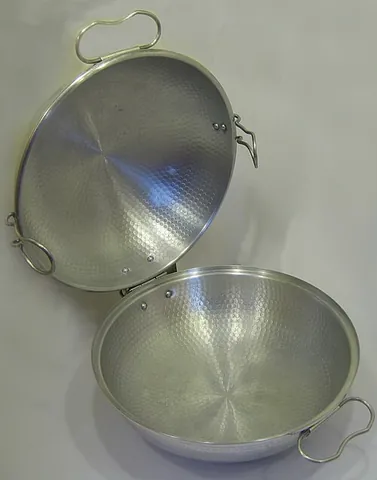 cataplana: a metal clamshell cooking dish from Portugal, used to cook certain seafood. It can be sealed using...