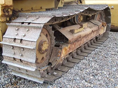 caterpillar track: a generic trademark name for a continuous track in the form of a steel or rubber belt fitted around...