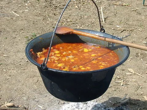 cauldron: a large bowl-shaped pot used for boiling over an open flame