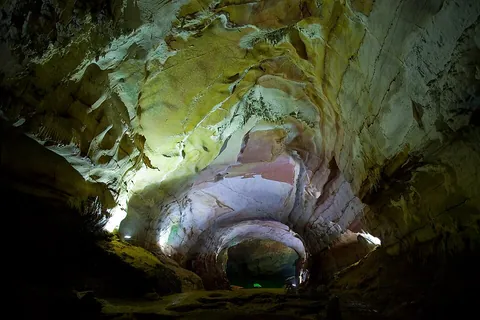 cave: a large, naturally-occurring cavity formed underground or in the face of a cliff or a hillside