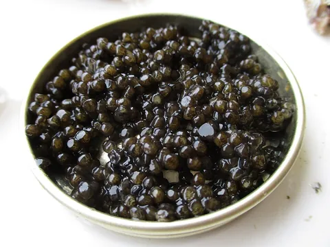 caviar: roe of the sturgeon or of certain other large fish, considered a delicacy