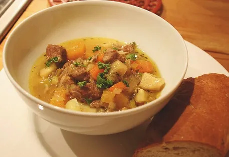cawl: a traditional Welsh soup, typically made with beef, lamb, or salted bacon with carrot, leeks,...