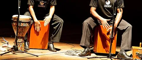 cajón: a box-shaped percussion instrument played by slapping the front or rear faces (generally thin...