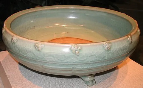 celadon: a pale green colour, possibly tinted with gray