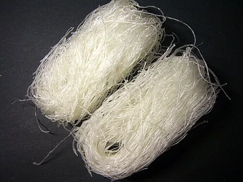 cellophane noodle: a transparent Asian noodle made from starch (such as mung bean starch, sweet potato or yam starch,...