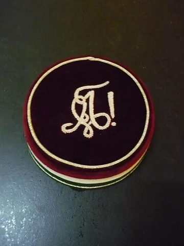 cerevis: a small cap, with no peak, worn by members of German student corps