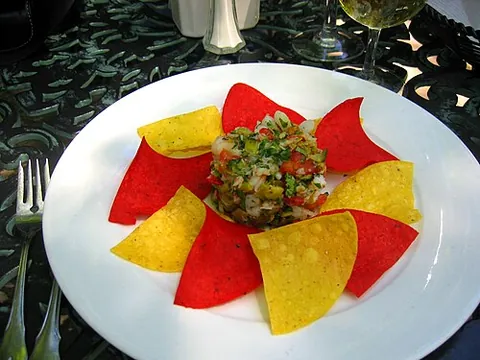 ceviche: raw seafood cured by marination in an acidic medium such as citrus, vinegar, or other souring...