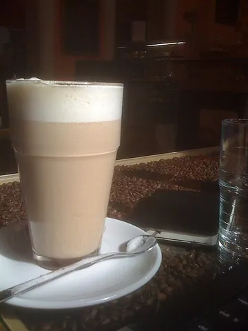 chai latte: a hot drink similar to masala chai or caffè latte, made with spiced tea and steamed milk