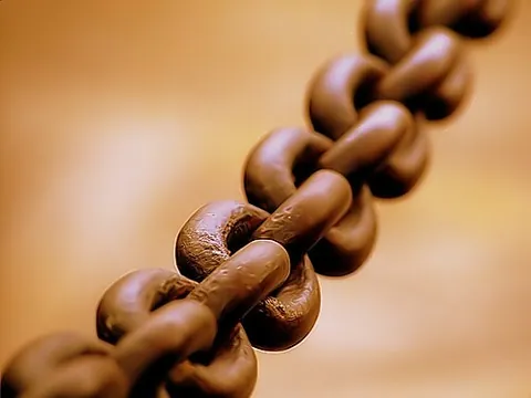 chain: a series of interconnected rings or links usually made of metal