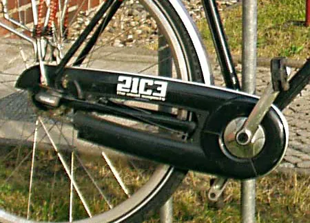 chaincase: a guard which fits around the chain of a bicycle to protect it from dirt and other environmental...