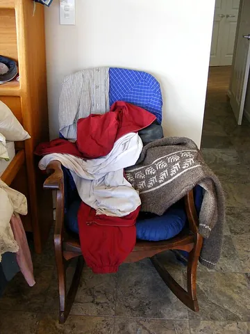 chairdrobe: a chair on which someone stores clothing that has been worn but which is not yet too dirty to wear...
