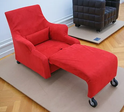 chaise longue: a reclining chair with a long seat, which can support the outstretched legs of a sitter normally...