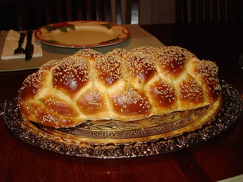 challah: a traditional bread eaten by Ashkenazi Jews, usually braided for the Sabbath and round for a yom tov