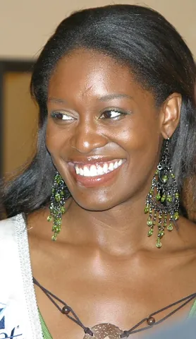 chandelier earring: a very long, ornate dangling earring, generally consisting of a tiered configuration of jewels and...