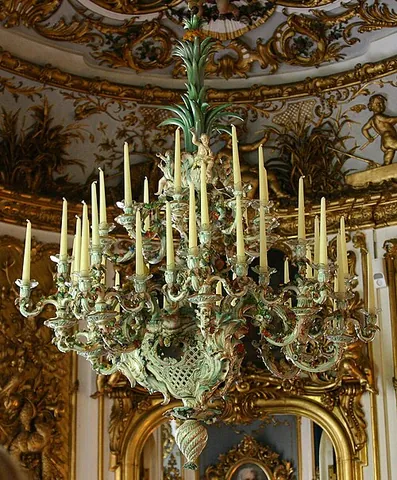 chandelier: a branched, often ornate, light fixture suspended from a ceiling