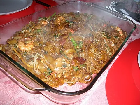 char kway teow: a Southeast Asian noodle dish made from flat rice noodles, soy sauce, chili, prawns and other...