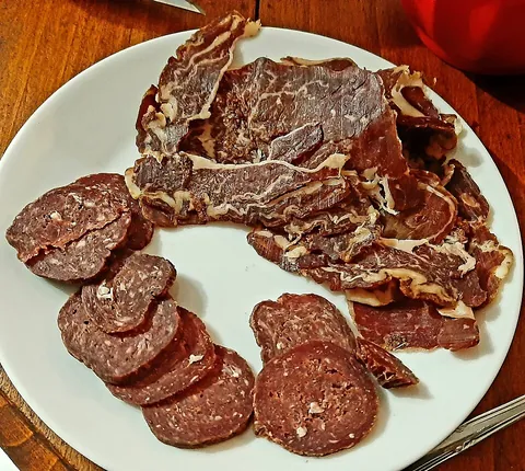 charcuterie: the practice of cooking and preparing ready-to-eat meat products, especially pork